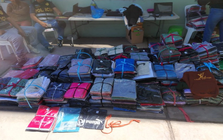 Intervienen taller clandestino de ropa falsificada